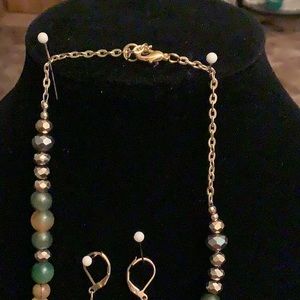 A necklace made of various agates,and metal spacer beads.